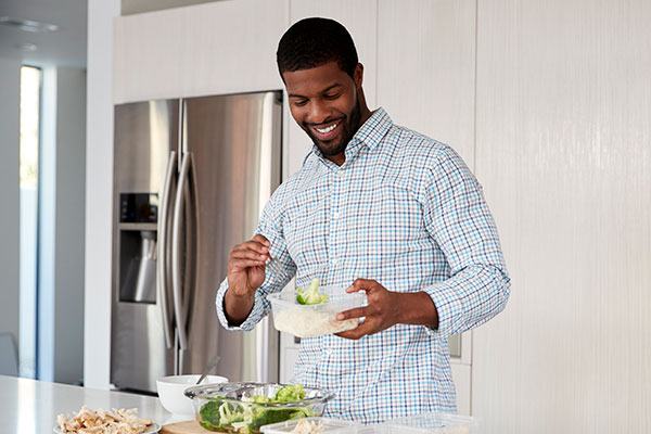 man preparing broccoli